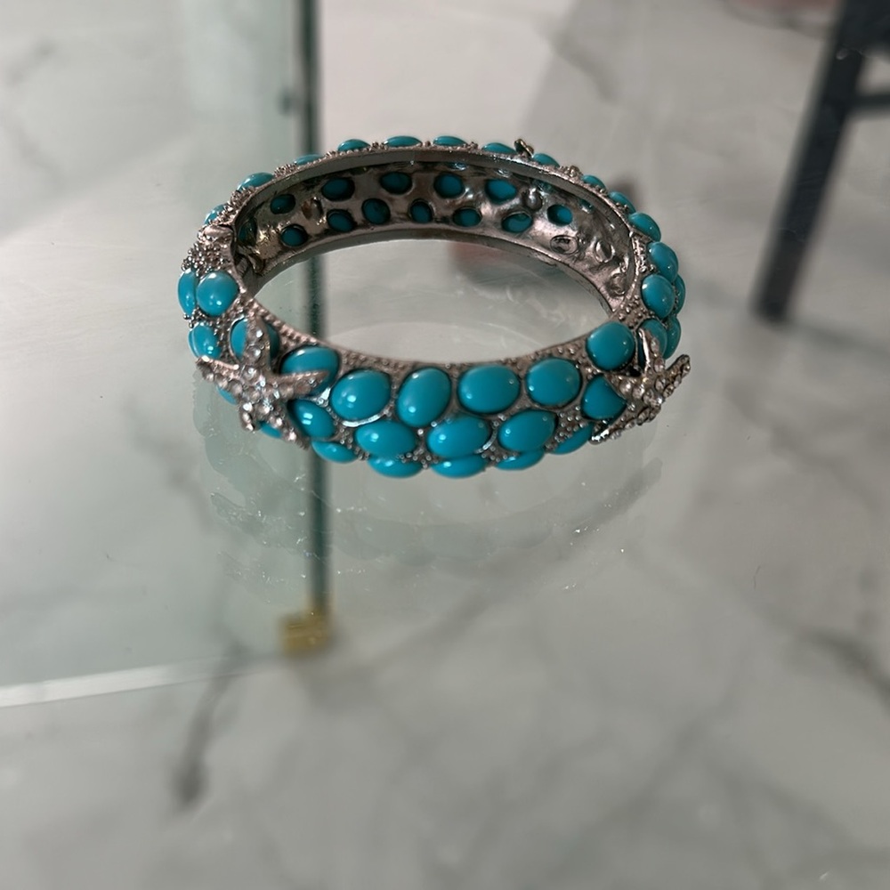 Diamond and Acqua Blue stone bracelet. Easy to get on and off.